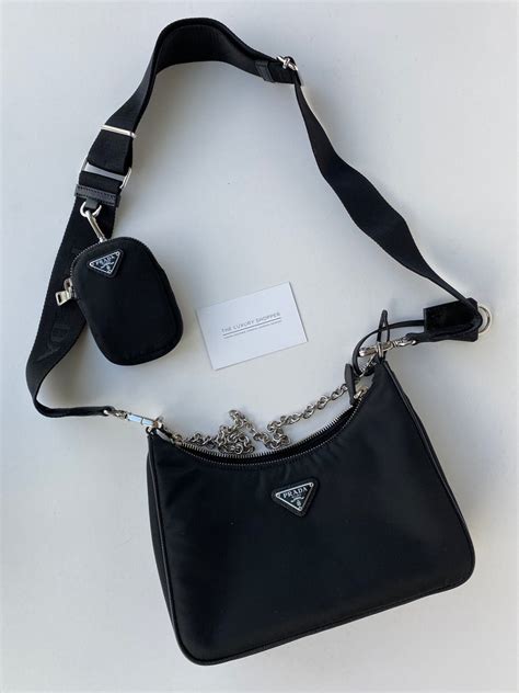 prada nylon crossbody women with pouch on the strap|Prada cross body nylon bag.